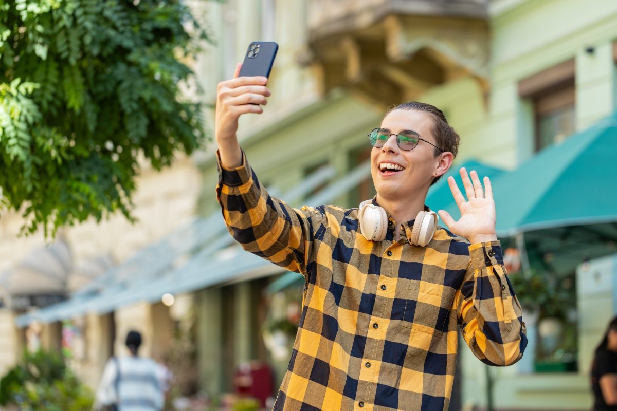 Traveler on a video call while exploring a city street